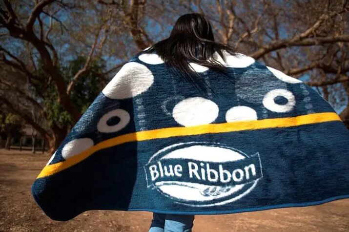 Personalised blankets being made for a corporate company.